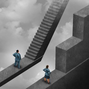 Gender discrimination and sexism inequality for being female concept as a woman with the burden of climbing a difficult obstacle and a man.